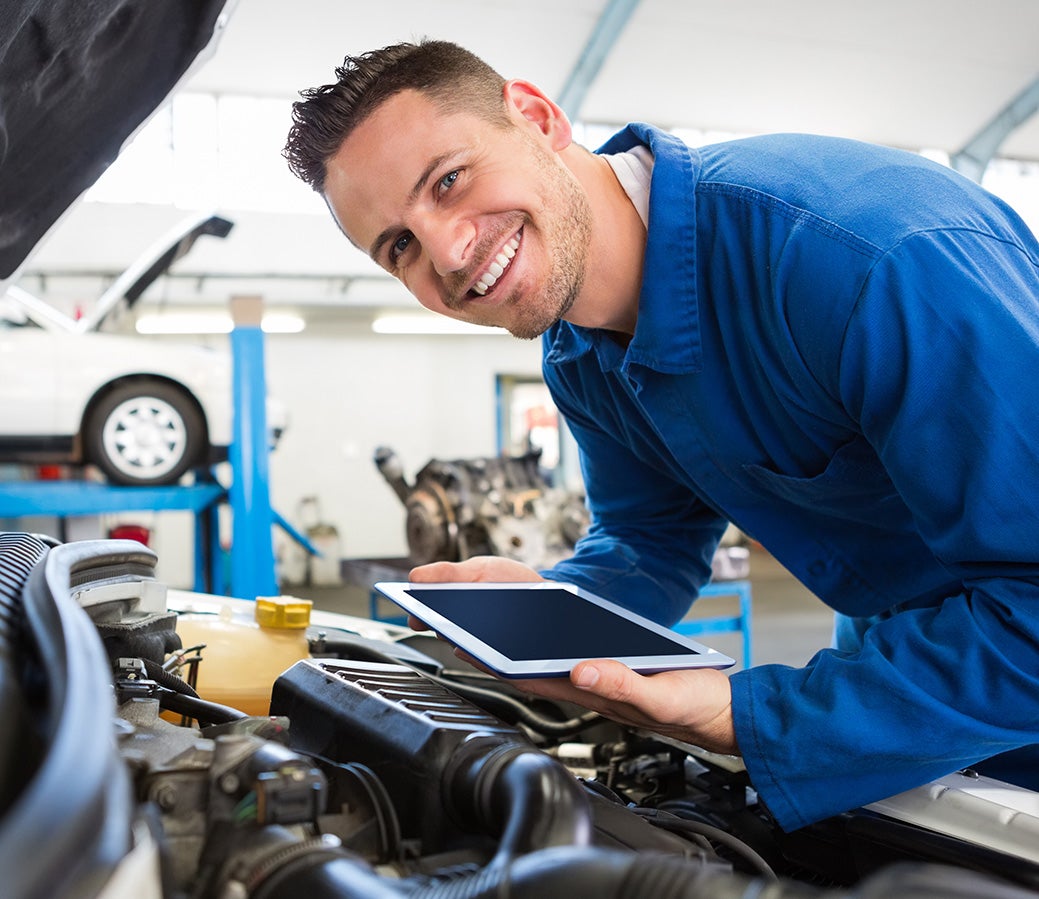 Technician Performing Premium Vehicle Inspection